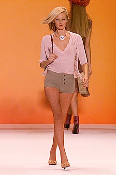 pink relaxed top with beige shorts