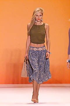 green cropped top with blue skirt