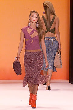 fitted purple top with ruffled pink skirt