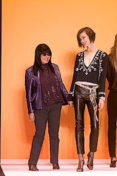 black embellished top and leather pants