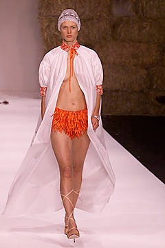 white maxi dress with orange shorts