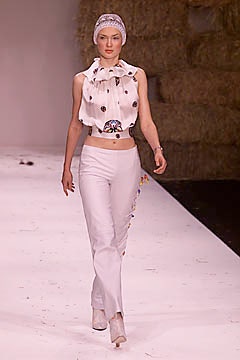 white cotton sleeveless collared fitted ruffled buttoned top