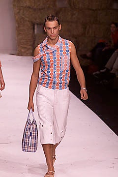 blue sleeveless collared fitted printed shirt