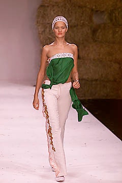 green sleeveless strapless fitted ruffled top
