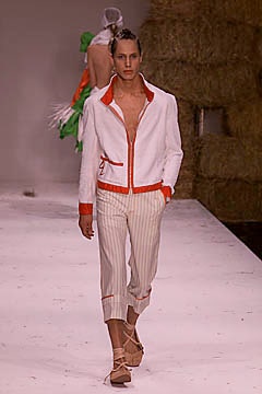 white fitted jacket with orange accents