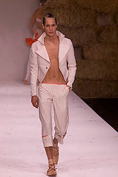 white fitted jacket and striped pants