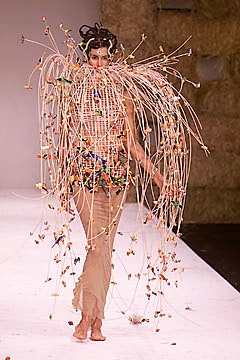 beige fitted dress with embellishments