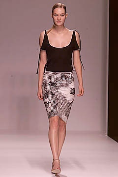 black fitted top with cutout and pencil skirt