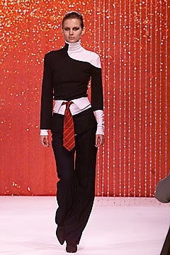 black and white asymmetric top with wide-leg pants