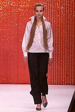white relaxed shirt and black pants