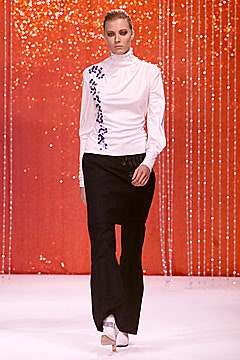 white fitted blouse with black skirt