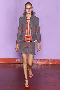 gray tailored jacket with red top