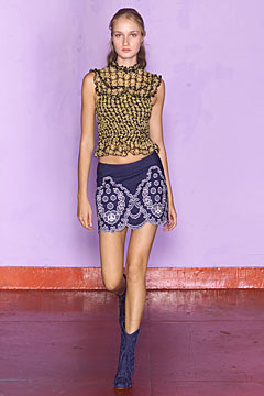 gold ruffled top with mini skirt