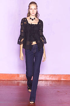 black lace blouse with blue jeans