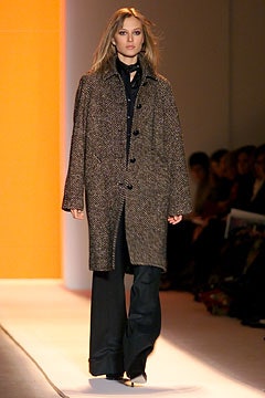 brown oversized wool coat and black tailored pants