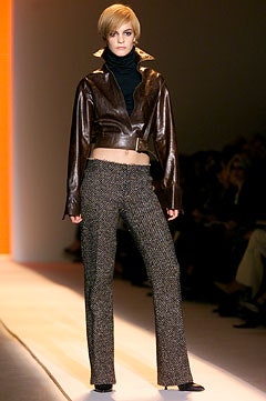 brown leather cropped jacket and black pants