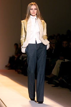 gold blazer white shirt gray pants