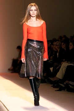 red fitted top black leather skirt