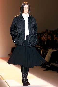 black relaxed jacket with flared skirt