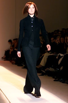 black tailored blazer and fitted pants