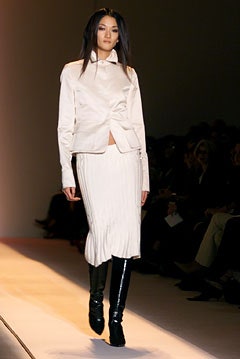 white fitted blazer and pleated midi skirt