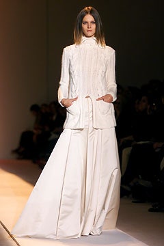 white structured blazer and flowing skirt