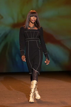 black fitted midi dress with beige boots