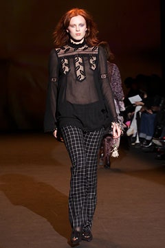 black sheer embroidered top with checked pants