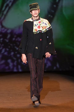 black embroidered top with brown pants