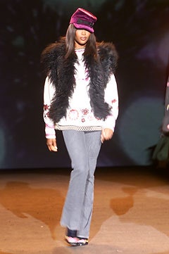 white embroidered sweater with faux-fur vest