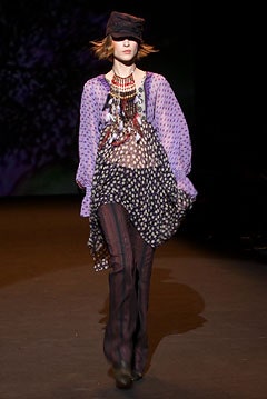 purple floral top with black pants