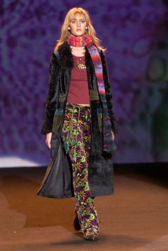 black faux-fur coat with multi pants