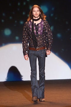 relaxed black printed shirt with flared jeans