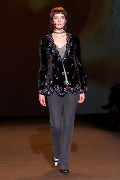 black velvet embroidered jacket with gray pants