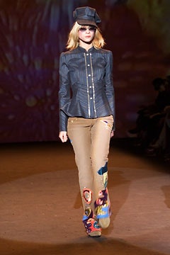 blue fitted jacket with beige pants