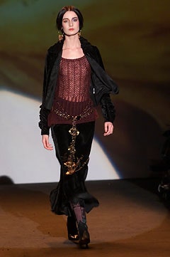 red silk sleeveless top with black velvet skirt