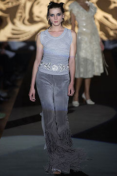gray fitted top with fringed pants
