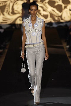 embroidered sleeveless top with flared pants