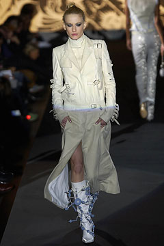 white fitted coat and boots