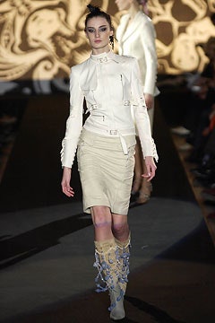 white fitted blazer with beige skirt