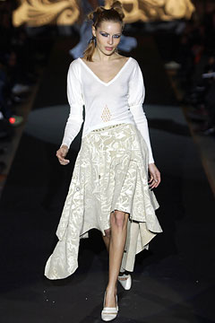 white fitted top and beige asymmetric skirt