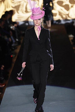 black tailored suit with pink hat