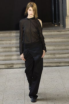 black sheer top and relaxed pants