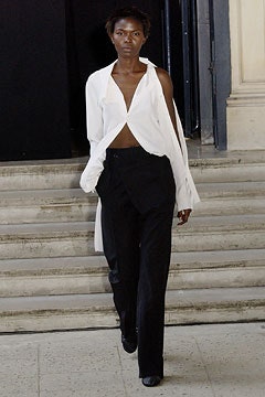 white relaxed shirt and black tailored pants