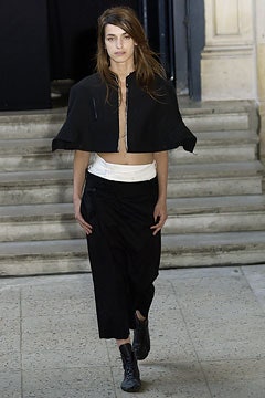 black wool cape with white cropped top