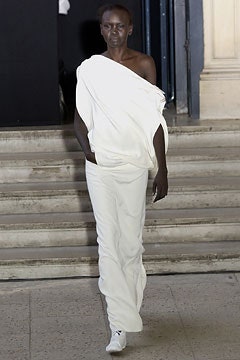 white off-shoulder top and fitted pants