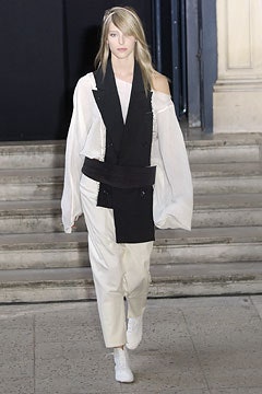 white relaxed blouse with beige pants