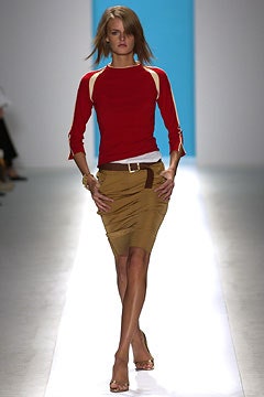 fitted red top and beige skirt