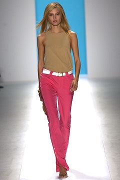 beige fitted sleeveless top and pink pants