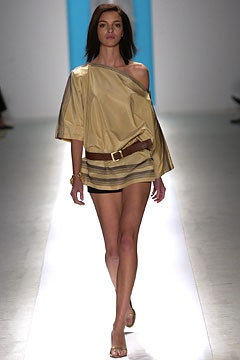 beige off-shoulder top with black shorts